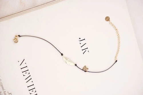 Damska Bransoletka Czarny Sznurek Celebrytka Złota Pióro Cleopatra